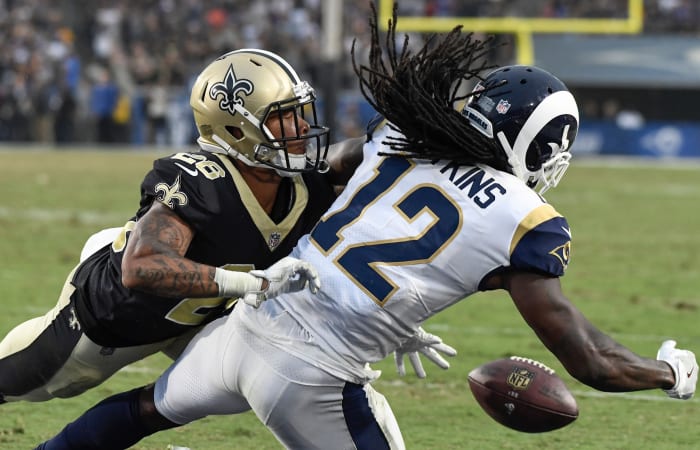 New Orleans cornerback P.J. Williams (26) breaks up a pass in the end zone to Rams receiver Sammy Watkins (12). Mandatory Credit: Robert Hanashiro-USA TODAY Sports